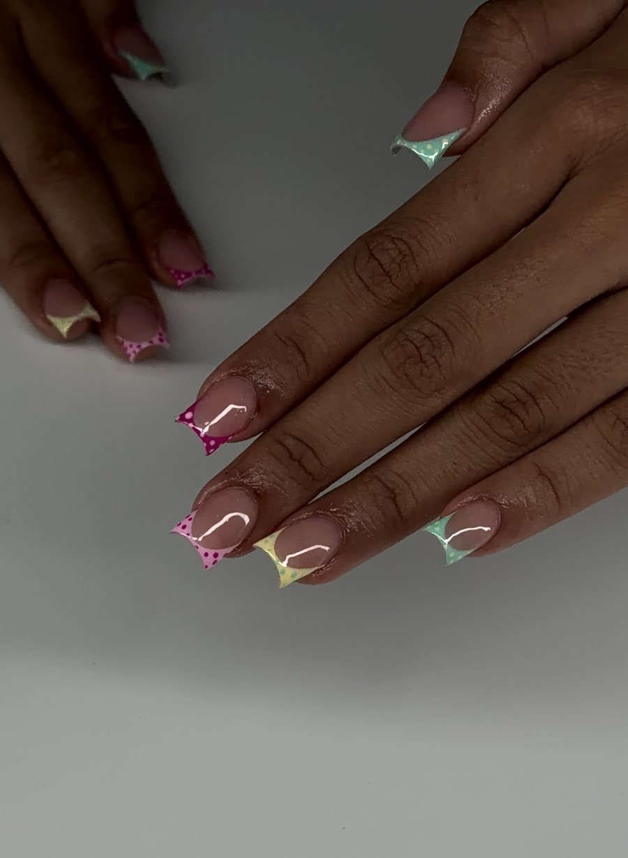 Pastel polka-dot French tips in pink, yellow and mint